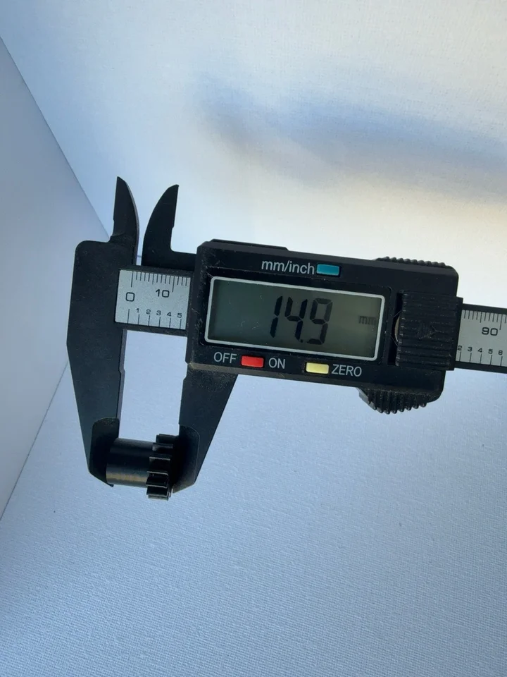 Brother Star 110 Pattern Selector Gear — original caliper photograph showing 14.9 mm across the shown length