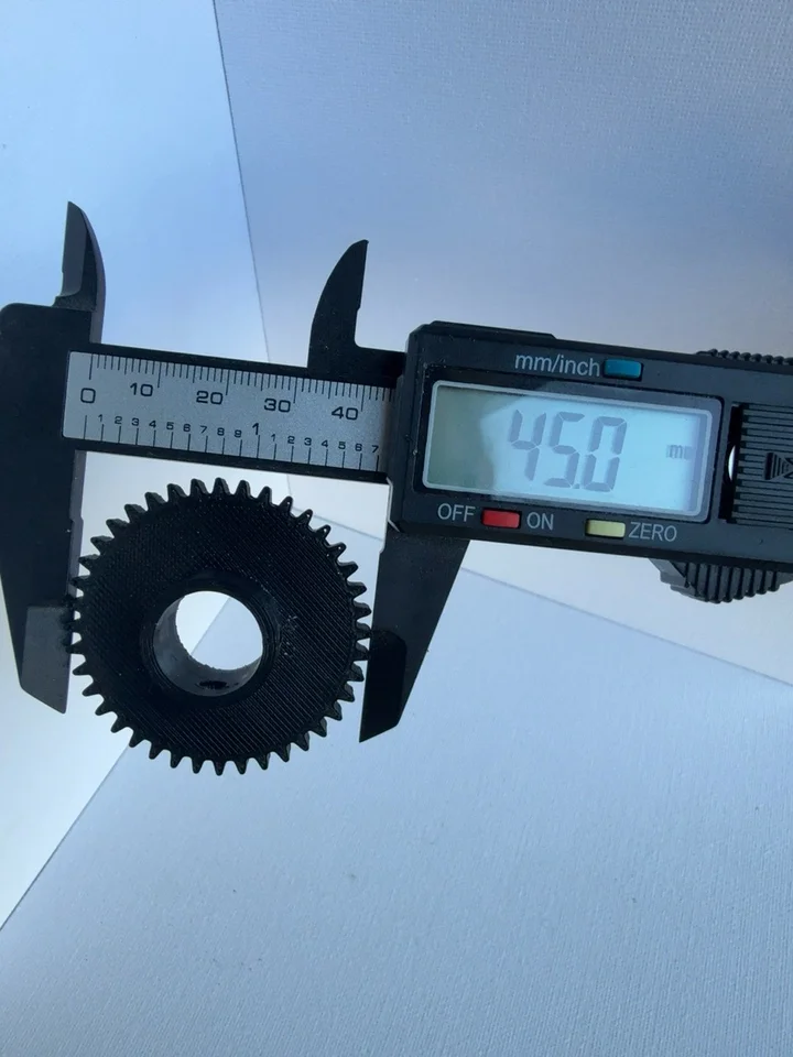 Caliper photograph showing 45.0 mm across the pictured gear contact points