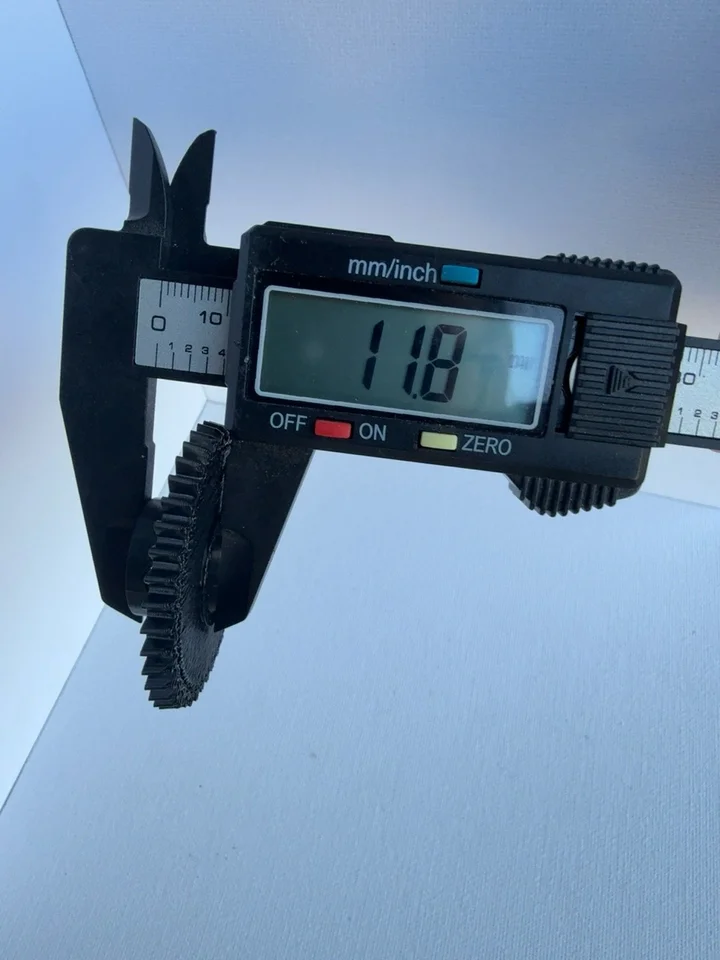 Caliper photograph showing 11.8 mm across the pictured height contact points