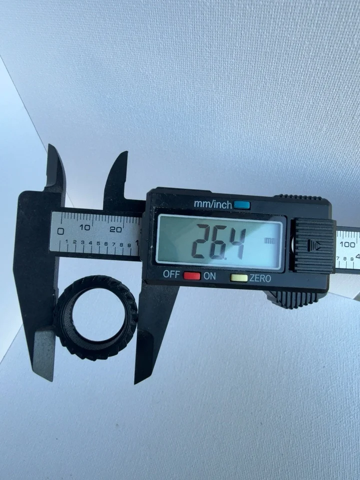 Caliper photograph showing 26.4 mm across the pictured outer contact points