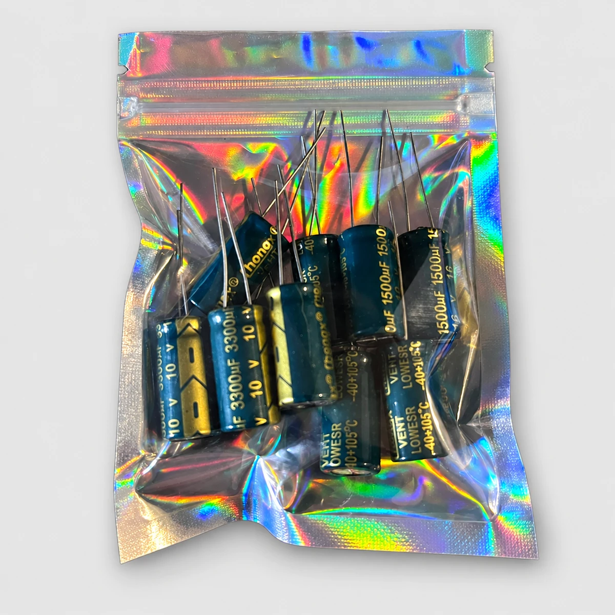 Original Xbox capacitor replacement kit in its iridescent resealable bag