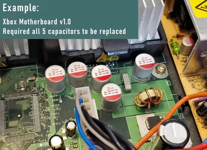 Original Etsy reference photograph showing an Xbox v1.0 motherboard with five capacitor positions